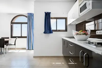 Una cocina o zona de cocina en Best Club Vacaciones Pueblo Indalo