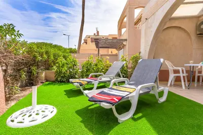 Jardín al aire libre en BeachHouse Playa R&R