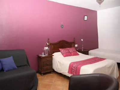 Cama o camas de una habitación en Casa Rural El Paraje de Berchules