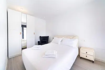 Cama o camas de una habitación en TrendyHomes Palmeral Beach Mojacar