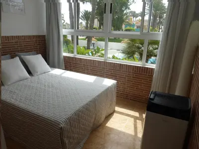Cama o camas de una habitación en Lovely studio at 150 meters from the beach