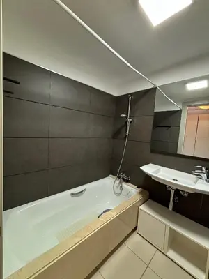 Un baño de Precioso piso a 10 min de la playa
