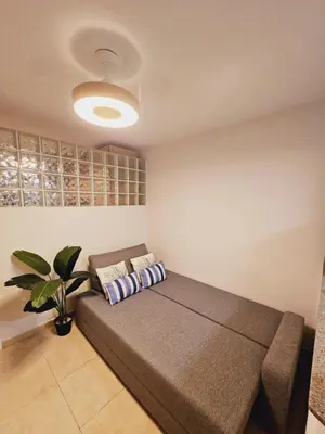 Cama o camas de una habitación en Apartamento Buganvilla Beach