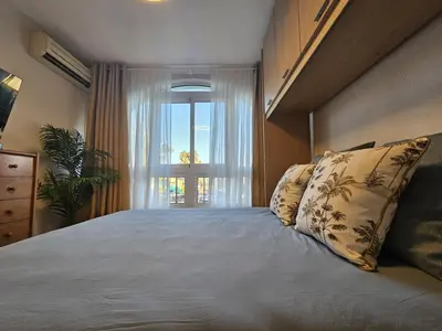 Cama o camas de una habitación en Apartamento Buganvilla Beach