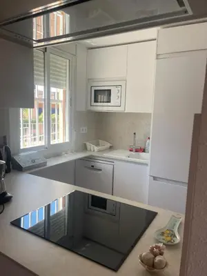 Una cocina o zona de cocina en Apartamento con vistas al mar