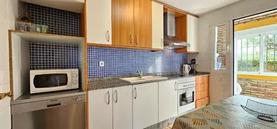 Una cocina o zona de cocina en Duplex de 3 dormitorios en Al Andalus Residencial, WIFI