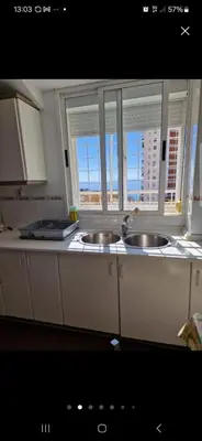 Una cocina o zona de cocina en Puerto Aguadulce 4g