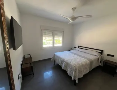 Cama o camas de una habitación en Quinto Pino playa