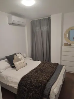 Cama o camas de una habitación en Beautifull Modern Apartment