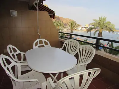Un balcón o terraza de AGUADULCE BEACH FRoNT