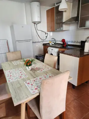 Una cocina o zona de cocina en Casa Baja tranquila con terraza y jardín en Vera-Playa naturista!