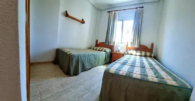 Cama o camas de una habitación en Chalet 3 dormitorios en VERAMAR 5 con jardín