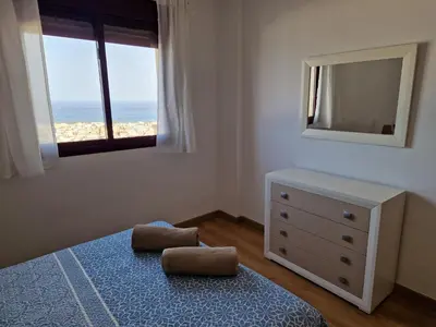 Cama o camas de una habitación en Vistas al mar