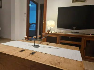 Una televisión o centro de entretenimiento en Apartamento sol playa deportes