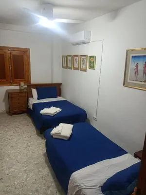Cama o camas de una habitación en Casa De Aventuras ideal for large groups