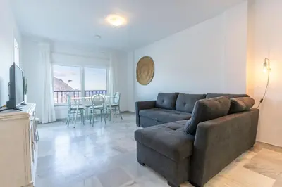 Una televisión o centro de entretenimiento en Oasis Vistas al Mar, 2min a la Playa