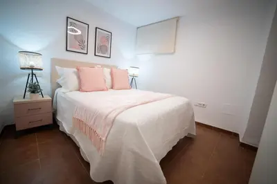 Cama o camas de una habitación en Guadix Catedral