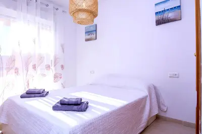 Cama o camas de una habitación en Vera Playa El Faro Magnifico Apart Piscina Wifi