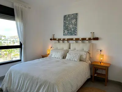 Cama o camas de una habitación en ViveVera - Chalet Palmera Golf Valle del Este