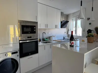 Una cocina o zona de cocina en Cabosun