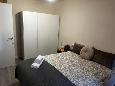 Cama o camas de una habitación en Apartamento en última planta 4 recien reformado en Playa La Colonia con Ascensor