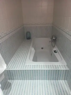 Un baño de Suite privada con terraza chill out