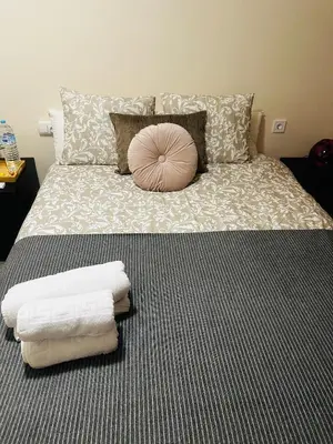 Cama o camas de una habitación en HABITACIONES A COMPARTIR EN APARTAMENTO RECIÉN REFORMADO EN PLAYa LA COLONIA