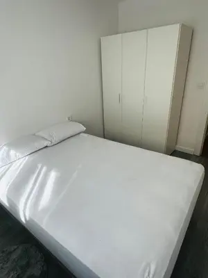Cama o camas de una habitación en HABITACIONES A COMPARTIR EN APARTAMENTO RECIÉN REFORMADO EN PLAYa LA COLONIA