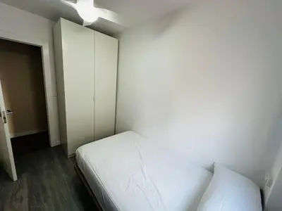 Cama o camas de una habitación en HABITACIONES A COMPARTIR EN APARTAMENTO RECIÉN REFORMADO EN PLAYa LA COLONIA