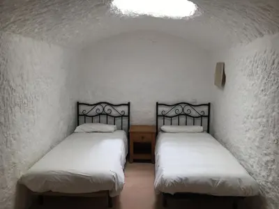 Cama o camas de una habitación en Cuevas del Cipres