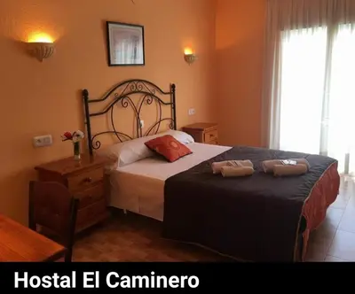 Cama o camas de una habitación en Hostal rural El Caminero