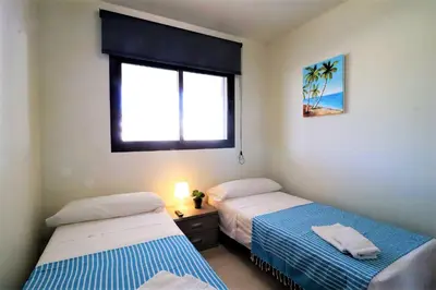 Cama o camas de una habitación en Azucenas, apto en residencial de lujo.