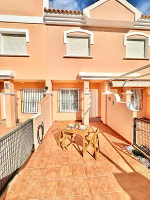 Un balcón o terraza de Adosado El Invencible