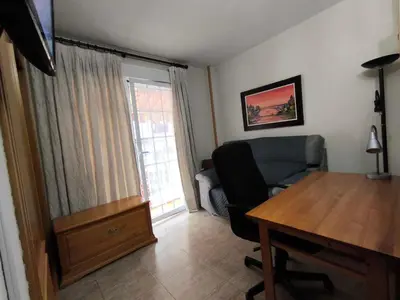 Zona de estar de Estudio con terraza junto al mar