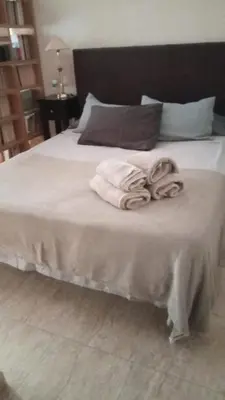 Cama o camas de una habitación en Estudio con terraza junto al mar