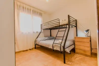 Cama o camas de una habitación en Los Collados con Jardín y Piscina By Aloha Palma