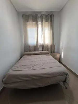 Cama o camas de una habitación en APARTAMENTO TURISTICO 2ºA CARLOS III - Cerca de la playa