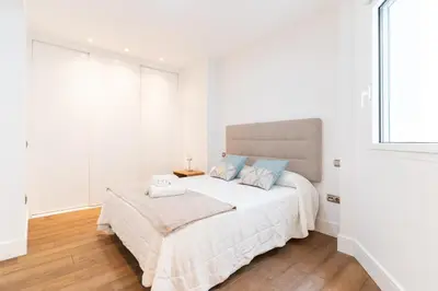 Cama o camas de una habitación en Luxury Conde Ofalia by Expovivienda