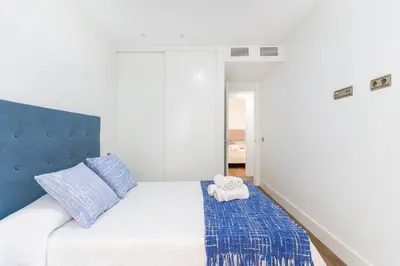 Cama o camas de una habitación en Luxury Conde Ofalia by Expovivienda