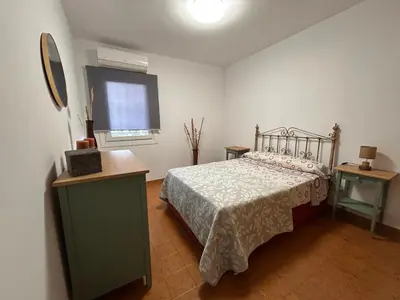 Cama o camas de una habitación en Faro de Mar