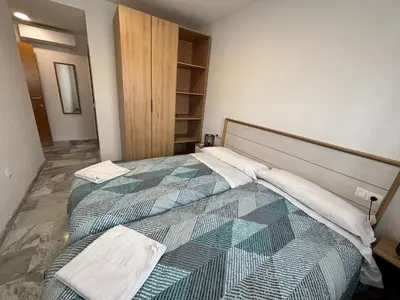 Cama o camas de una habitación en Alojamientos CASTILLA-AGAVE