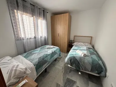 Cama o camas de una habitación en Alojamientos CASTILLA-AGAVE