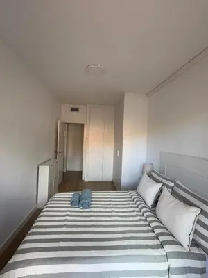 Cama o camas de una habitación en Apartamento Villas de Almerimar