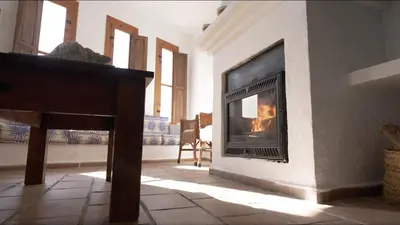 Una televisión o centro de entretenimiento en Casa Nieto con vistas al mar