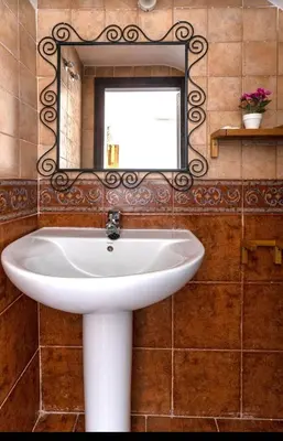 Un baño de casa pura vida
