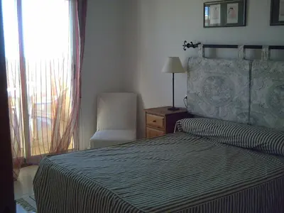 Cama o camas de una habitación en primera linea de playa
