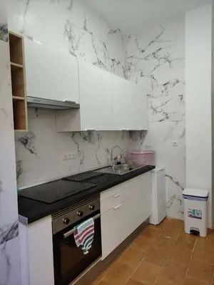 Una cocina o zona de cocina en Al-Mariyya Centro Ciudad