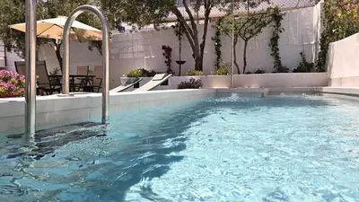 Piscina en o cerca de Anzuelo - Apartamento con piscina privada y jardín cerca de la playa aire acondicionado
