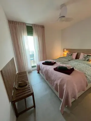 Cama o camas de una habitación en Cozy new penthouse apartment Cantal Homes