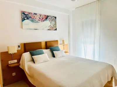 Cama o camas de una habitación en Vera Playa Laguna Beach